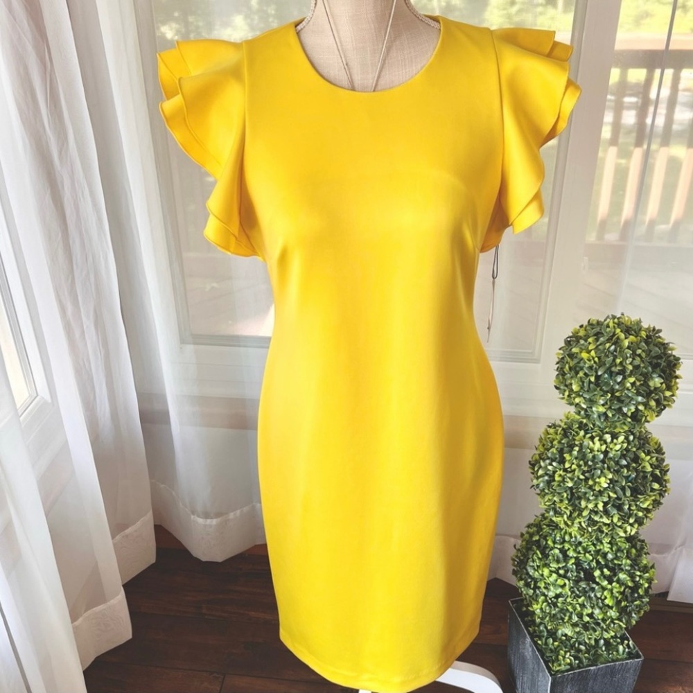 Tommy Hilfiger Scuba Crew Neck Flutter Ruffle Cap Sleeve Dress
Yellow Size 8 NWT - Picture 3 of 16
